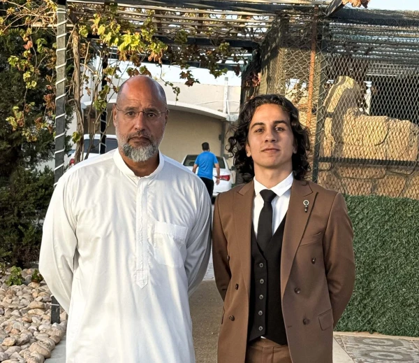 Saifalislāms Kadafi un Ahmeds Kadafi.